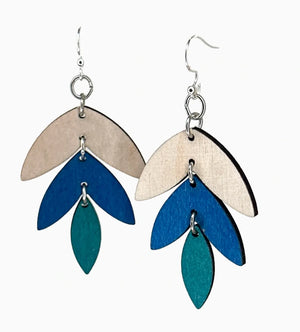 Colorful leaf-shaped earrings on a white background