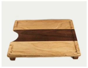 Wooden cutting board on a white background