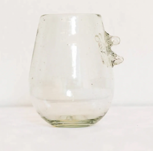 Clear glass with sculptural thorn design on a white background