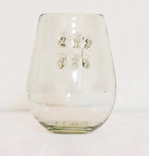 Clear glass with sculptural thorn design on a white background