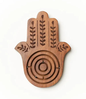 Wooden Hamsa hand maze toy on a white background