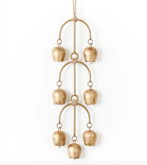 Decorative hanging gold chime with multiple bells on a white background