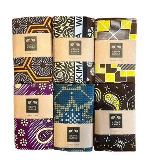 Set of Kenya Kanga fabric packages with various patterns on a white background