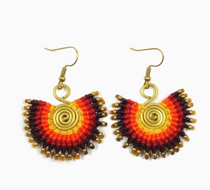 Pair of colorful beaded earrings with gold accents on a white background