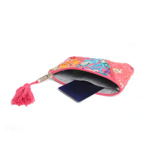 Floral pouch with a tassel on a white background