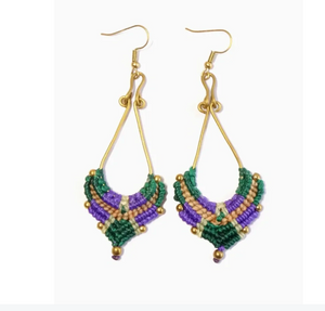 Pair of beaded earrings with green, purple, and gold colors on a white background
