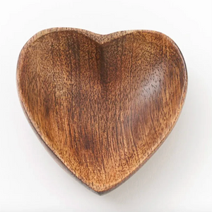 Wooden heart-shaped bowl on a white background