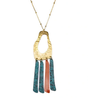 Necklace with a gold pendant and colorful hanging elements on a white background