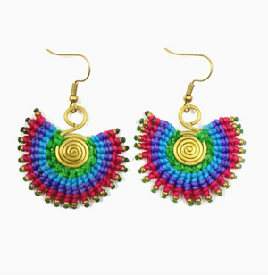 Colorful beaded earrings with gold spiral centers on a white background