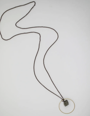 Necklace with a pendant on a white background