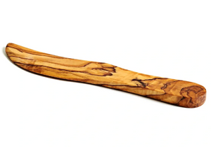 Wooden knife with a natural finish on a white background