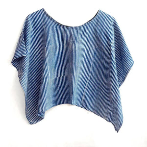 Blue and white striped top on a white background
