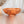 Wooden bowl on a wooden surface with a blurred background