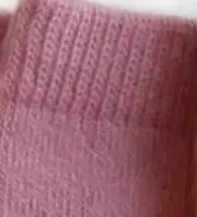 Close-up of pink knitted fabric