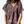 Person wearing a patterned blouse with short sleeves on a white background