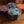 Set of colorful round coasters on a wooden surface