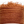 Brown textured fabric with frayed edges on a white background