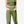 Person wearing green pants and a cropped top on a white background