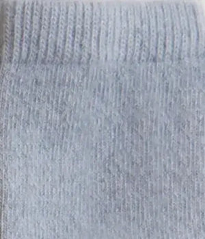 Close-up of a textured blue fabric surface