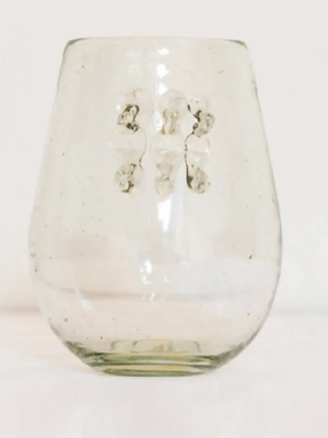 Clear glass with sculptural thorn design on a white background