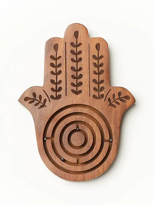 Wooden Hamsa hand maze toy on a white background