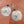 Silver star-shaped earrings on a wooden surface