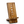 Wooden phone stand with moon phase design on a white background
