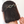 Person with a slide and stick hair accessory on a plain background