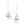 Pair of silver dangle earrings on a white background
