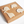 Set of four animal-shaped wooden wall hooks in a cardboard box, with 'Jacaranda Wood Wall Hooks' branding.