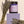 Kandu lavender cypress candle with lavender sprigs on a beige background