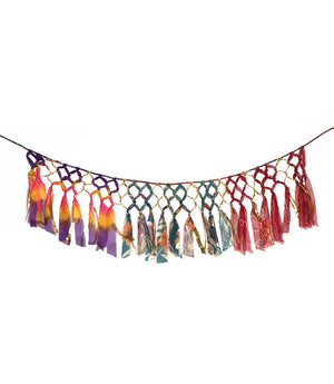 Colorful tassel garland on a white background