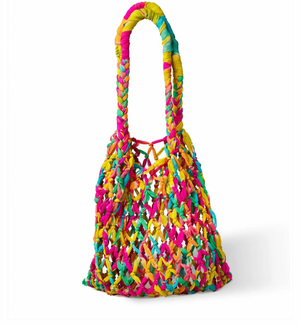 Colorful woven handbag on a white background