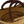 Close-up of a woven tote basket with a brown handle on a white background