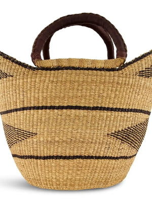 Woven tote basket with brown handles on a white background