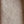 Close-up of a textured brown fabric surface