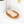 Bar of soap on a wooden soap dish with a white background