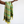 Striped green and yellow scarf held by a person on a white background