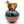 Black ceramic holder with floral patterns containing wooden spoons on a white background