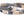 Multistrand bracelet with a round metal clasp on a white background