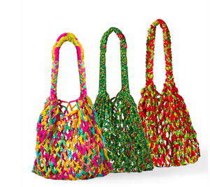 Three colorful woven bags on a white background