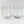 Two clear glass tumblers on a white background