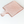 Textured pink glass cutting board on a white background