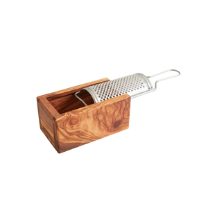 Wooden grater with metal blade on a white background