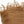 Brown textured fabric with frayed edges on a white background