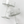Two clear glass stemware pieces on a white background