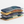 Stack of patchwork pillows in various colors on a white background