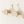 Wooden animal-shaped hooks on a white wall