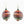 Colorful spiral earrings on a white background