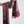 Multicolored striped scarf with fringes held by a person against a white background